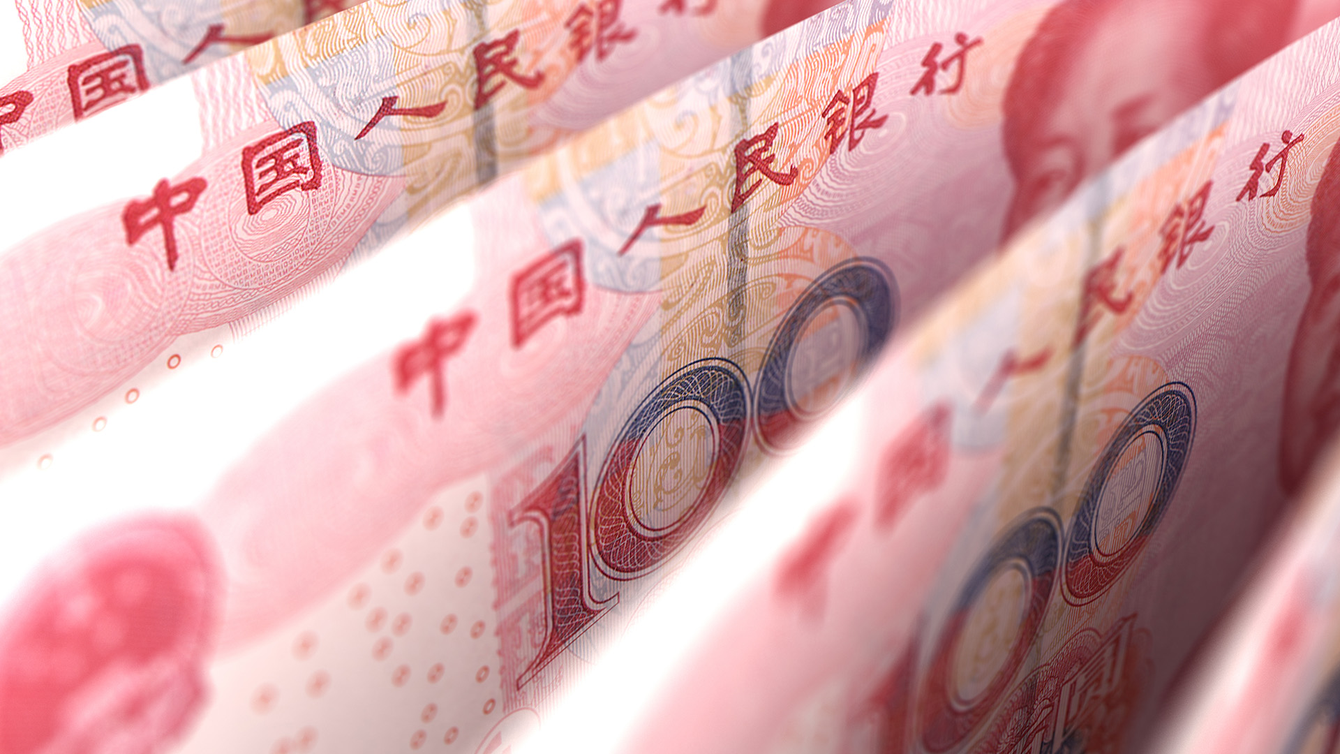 Chinese Yuan 100 bills amid Yuan At the Weakest Level in Three Months