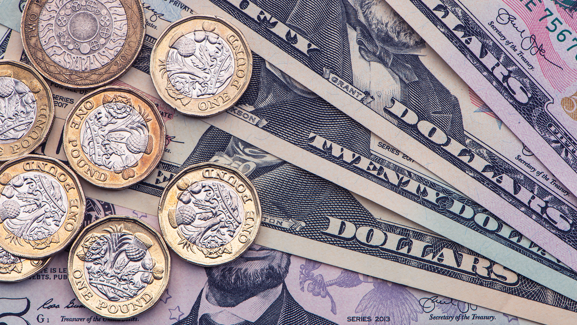 US dollar coins and bills amid Fed's slowing down hikes