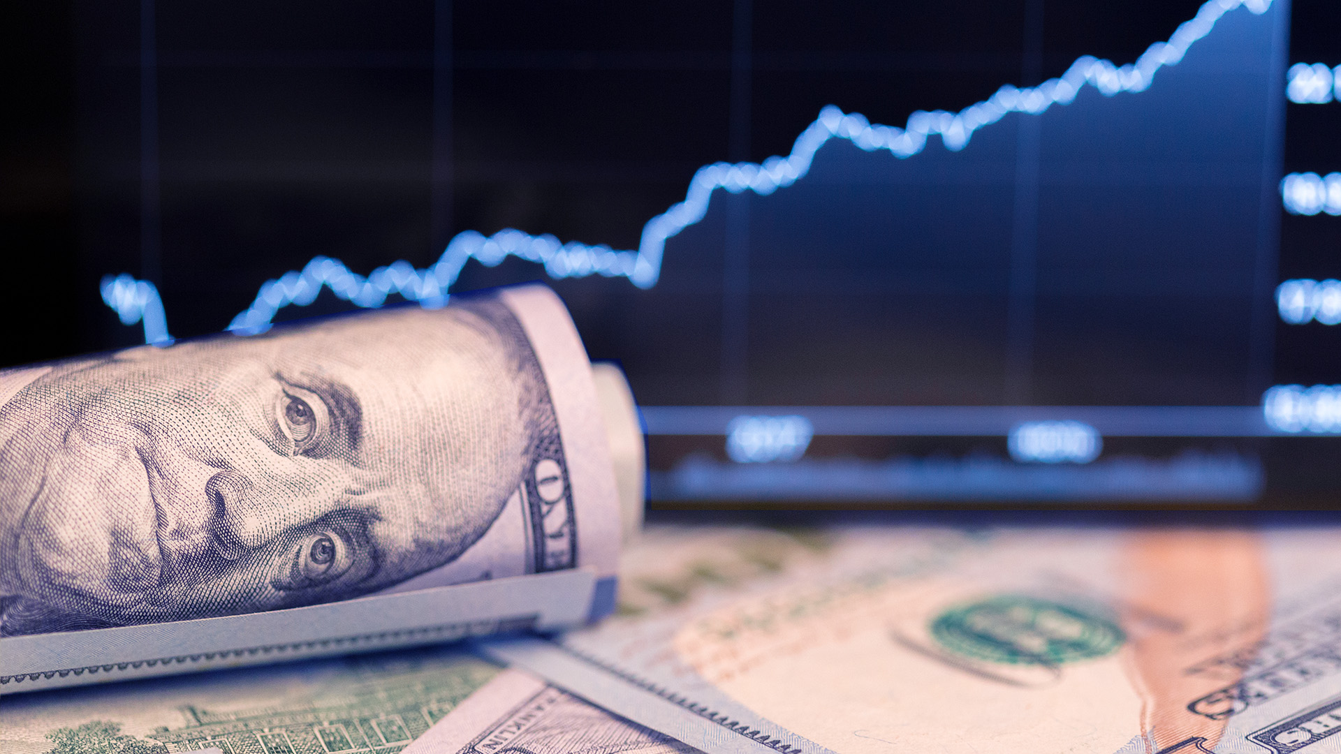 US dollar bill with a rising chart amid The Dollar Surges and Reaches Levels Of 104.40