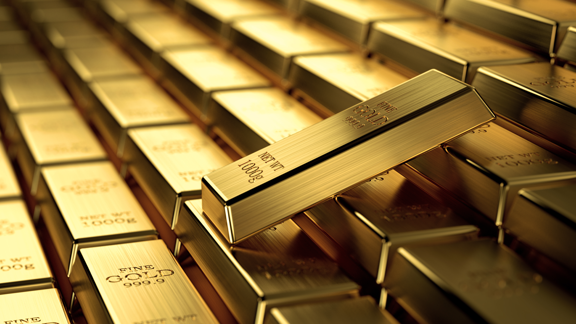 Pile of gold bars amid Gold Bounces Back Above $1,980