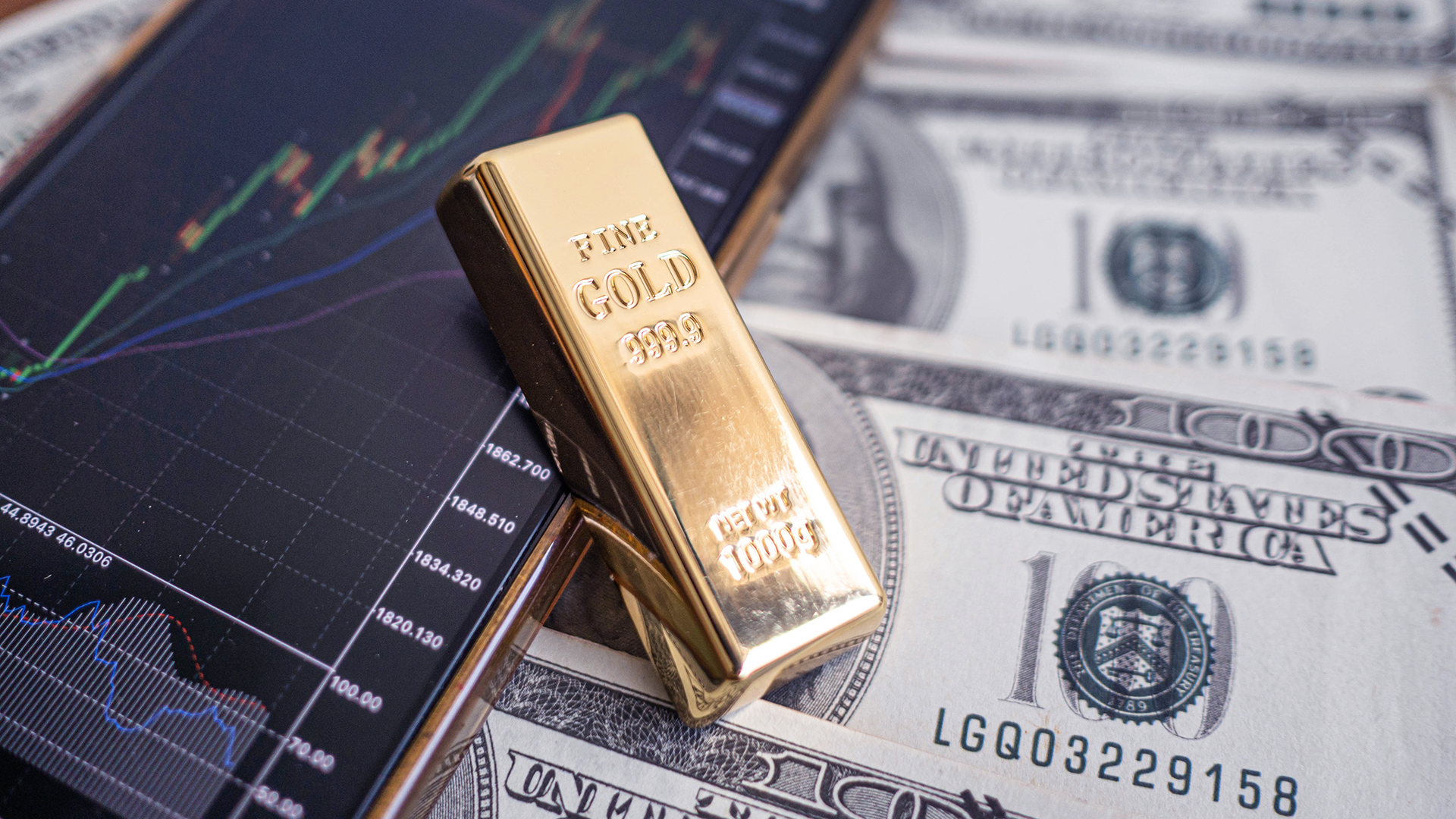 US dollar bills and a old bar amid Gold Declines and Dollar Stabilizes